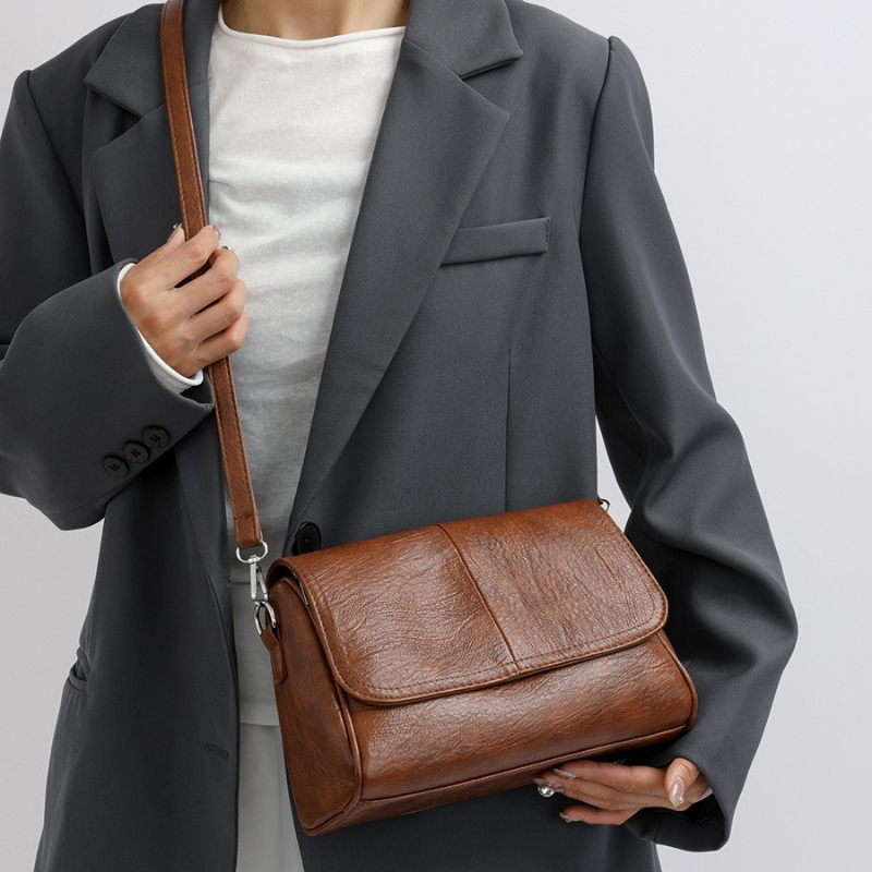 Miękka torebka crossbody z imi – Vintage Leatherwork recenzja i cena